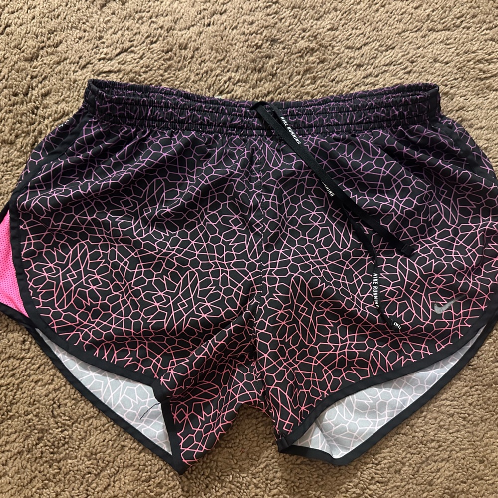 Pink and purple Nike shorts with built in underwear